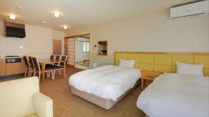 Ένα ή περισσότερα κρεβάτια σε δωμάτιο στο Reyzenit Kinosaki Suite VILLA +41 φωτογραφίες