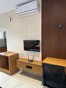 TV a/nebo společenská místnost v ubytování Rivera resort and wellness center + 2 fotografie