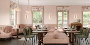 een restaurant met tafels, stoelen en ramen bij Ardour Milton Park Bowral in Bowral