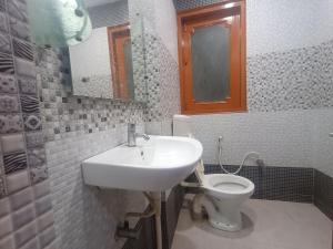 Ένα μπάνιο στο Hotel Shimla Inn