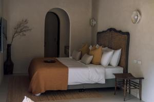 Ένα ή περισσότερα κρεβάτια σε δωμάτιο στο Daily Blossom Stay & More