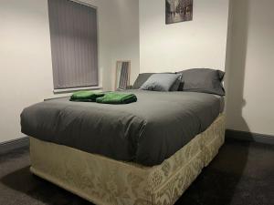 Ένα ή περισσότερα κρεβάτια σε δωμάτιο στο Shelton Guest House