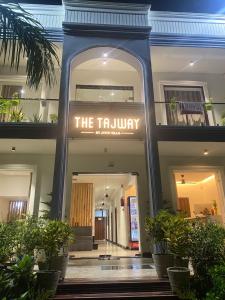 a building with a sign that reads the trolley at Hotel Taj Way by Jyoti Villa in Agra