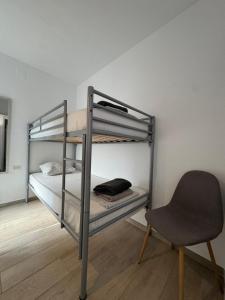 Ένα ή περισσότερα κρεβάτια σε δωμάτιο στο Modern cozy appartement Empuriabrava +3 φωτογραφίες