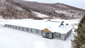 Το Xuegu Xuefu Lai Inn τον χειμώνα