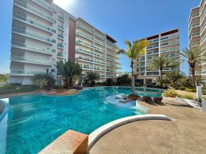 Bazén v ubytování Depa en la Marina Mazatlan Familiar Cerca de la Playa nebo v jeho okolí