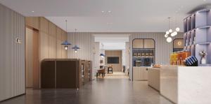 een grote kamer met aasteryasteryasteryasteryasteryasteryasteryasteryasteryasteryasteryasteryasteryasteryasteryasteryasteryastery bij Holiday Inn Express Shenzhen Sports Center by IHG in Shenzhen +2 foto's