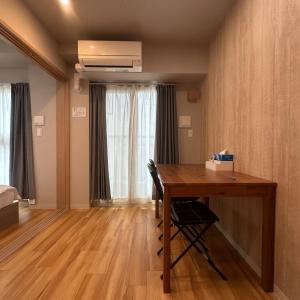 Ένα ή περισσότερα κρεβάτια σε δωμάτιο στο Dc桜の苑-花園町店