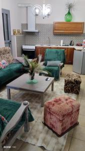 a living room with a couch and a table at MATEO in Livadeia +51 photos