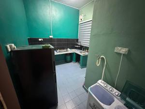 Ένα μπάνιο στο D umie Homestay