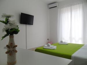 Postel nebo postele na pokoji v ubytování Il Piccolo Porto