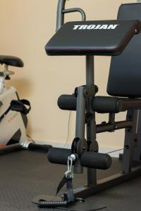 an office chair with a table on top of it at Simphiwe Guesthouse in Manzini