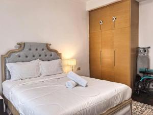 Postel nebo postele na pokoji v ubytování R&F Princess Cove 3BR Boutique JB Central CIQ