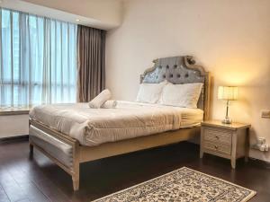 Postel nebo postele na pokoji v ubytování R&F Princess Cove 3BR Boutique JB Central CIQ