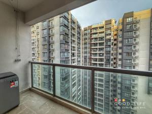 a balcony with a view of some tall buildings at R&F Princess Cove 3BR JB Central CIQ Spacious in Johor Bahru +16 photos