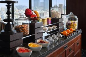 a buffet with different types of fruits and vegetables at Hyatt Regency Naha, Okinawa in Naha +71 photos