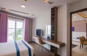 Μια τηλεόραση ή/και κέντρο ψυχαγωγίας στο Mermaid Seaside Condotel +7 φωτογραφίες