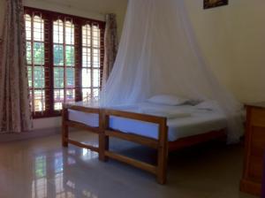 Ένα δωμάτιο στο Green Garden Ayurvedic Resort & Green House