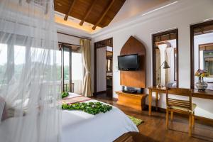 O cameră la Royal Muang Samui Villas - SHA Extra Plus