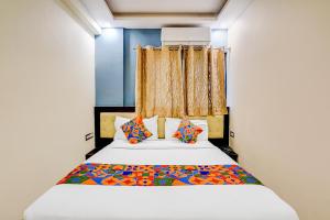 Ένα ή περισσότερα κρεβάτια σε δωμάτιο στο Via Royal Regalia Inn +20 φωτογραφίες