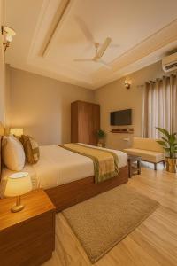 Voodi või voodid majutusasutuse Hotel Citrine, Vrindavan - A Four Star Luxury Retreat # By Nandan Group # toas