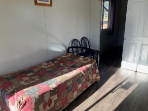 Postel nebo postele na pokoji v ubytování Major Mitchell Caravan Park