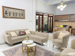 Posezení v ubytování Villa Wangko