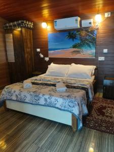 Postel nebo postele na pokoji v ubytování Jasmine Beach Resort + 65 fotografií