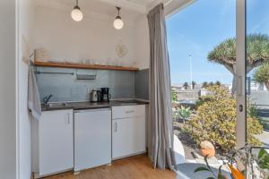 Η κουζίνα ή μικρή κουζίνα στο Art Suites