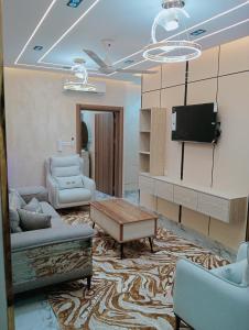 Μια τηλεόραση ή/και κέντρο ψυχαγωγίας στο جرادات للشقق المفروشه