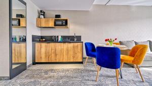 Kuchyň nebo kuchyňský kout v ubytování Złoty Horyzont, Sun & Snow