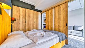 Postel nebo postele na pokoji v ubytování Złoty Horyzont, Sun & Snow