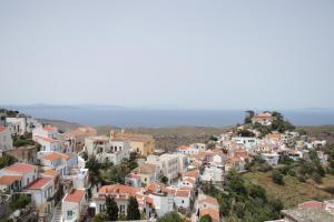 a view of a town with white houses at VILLA CALLIOPE KEA in Ioulida