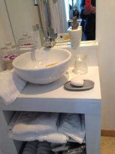 a bathroom counter with a sink and a mirror at MARIAC , Chambres d'hôtes "AU TILLEUL" 6km du Cheylard in Mariac +19 photos