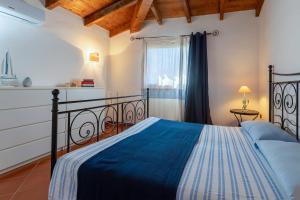 Postel nebo postele na pokoji v ubytování Villa Rosa Con Piscina Privata