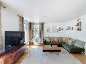 Et tv og/eller underholdning på Appartement Caen Rives de lOrne