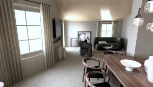 a living room with a table and chairs and a couch at fuchs am meer in Mitterhofen +1 photo