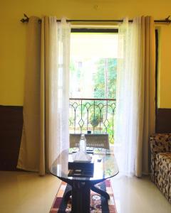 Posezení v ubytování Minimalist 1-Bedroom Apartment Near Candolim Beach