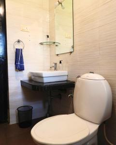 Koupelna v ubytování Minimalist 1-Bedroom Apartment Near Candolim Beach