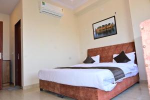 Postel nebo postele na pokoji v ubytování Hotel Runway + 16 fotografií