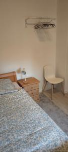 Ένα ή περισσότερα κρεβάτια σε δωμάτιο στο Einzelzimmer 2 mit gut ausgestatteter Gemeinschaftsküche