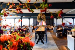 En restaurant eller et andet spisested på Ferienwohnung Gut Immenhof