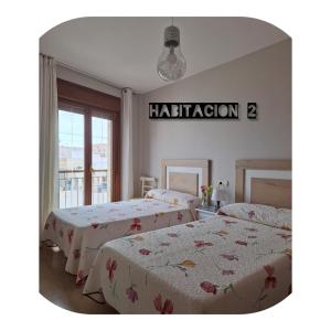 Postel nebo postele na pokoji v ubytování Apartamento nuevo en pleno centro.