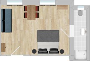 a floor plan of a living room with a couch at Gästehaus Jekle in Neuburg an der Kammel