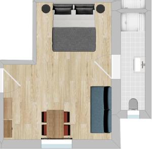a floor plan of a bedroom with a bed at Gästehaus Jekle in Neuburg an der Kammel