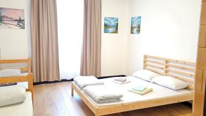 Postel nebo postele na pokoji v ubytování Downtown Belgrade Hostel and Apartments