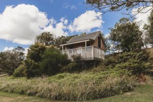 a house perched on top of a hill at The River Retreat - off the grid escape in Inglewood