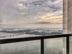 a view of a river and a city from a building at R&F Princess Cove 2BR Sea View JB-SG Spacious in Johor Bahru