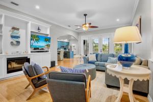 Televiisor ja/või meelelahutuskeskus majutusasutuses Flip Flops and Fish Tales