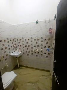 Koupelna v ubytování Brij Home Stay + 3 fotografie